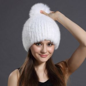 Зимна дамска шапка цялата от естествен  косъм норка с топка лисица