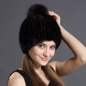 Зимна дамска шапка цялата от естествен  косъм норка с топка лисица