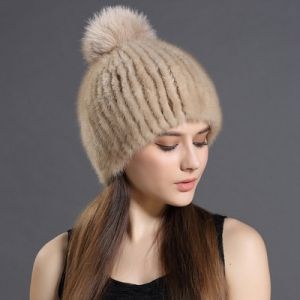 Зимна дамска шапка цялата от естествен  косъм норка с топка лисица