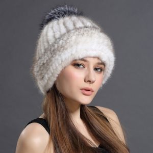 Зимна дамска шапка цялата от естествен  косъм норка с топка лисица
